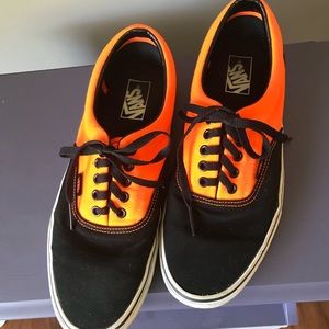 Vans neon orange and black sneakers
